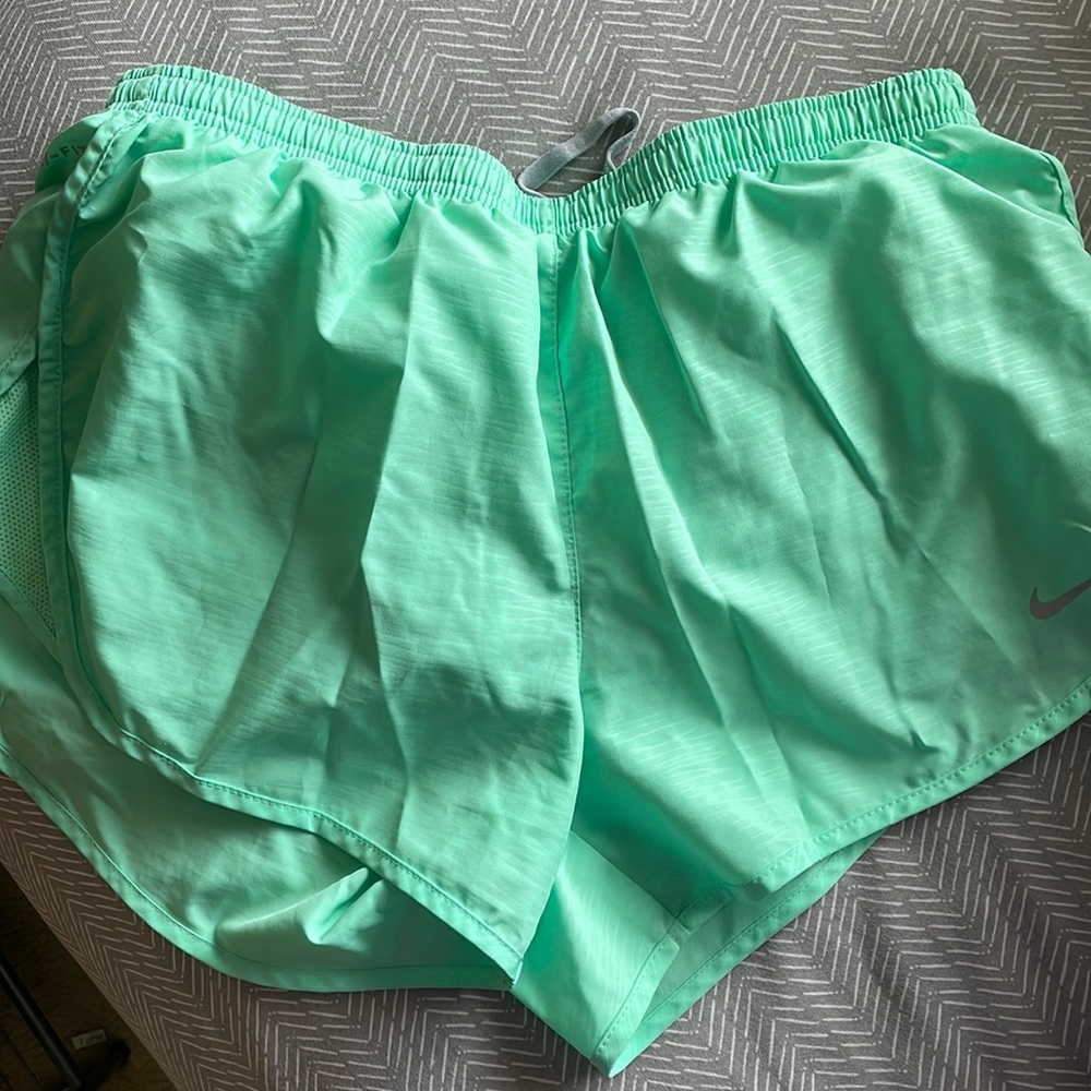Bright green Nike shorts